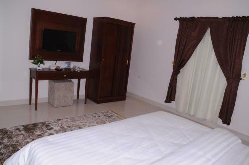 Apartamento Makarm Palm Hotel Suites