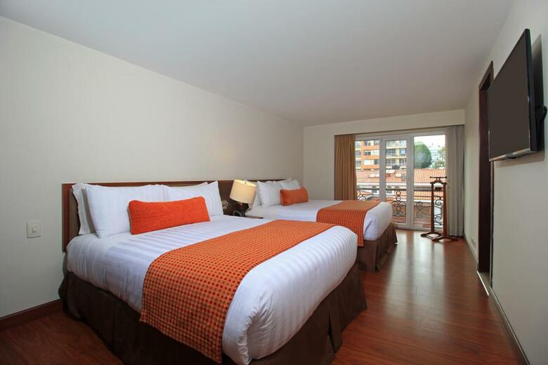 Hotel Windsor House Inn By Geh Suites