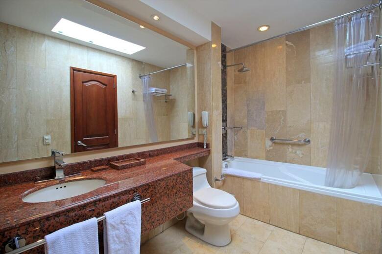 Hotel Windsor House Inn By Geh Suites