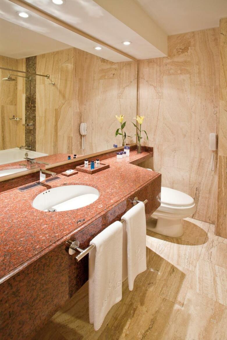 Hotel Windsor House Inn By Geh Suites