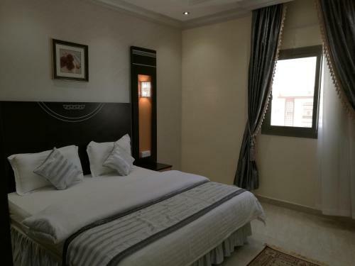 Apartamento Al Ezzah Palace Hotel Suites