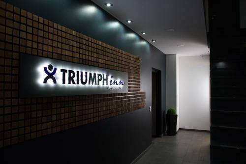 Apartamento Triumph Inn