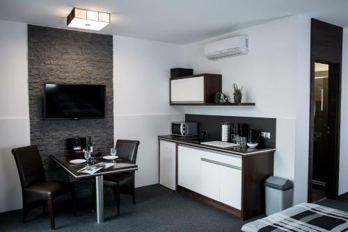 Apartamento Triumph Inn