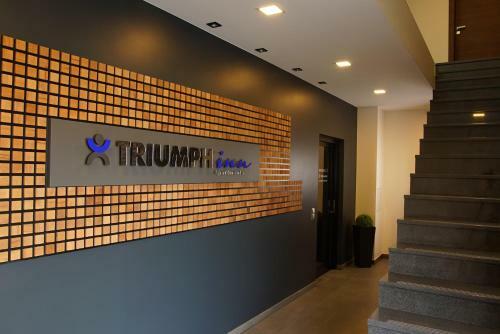 Apartamento Triumph Inn