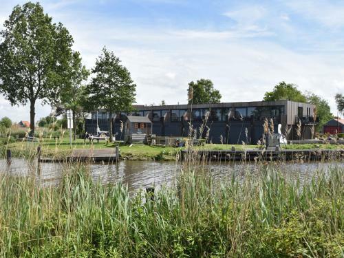 Charming Apartment In Langweer With Jetty