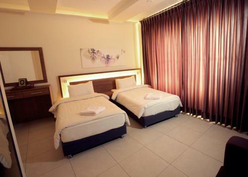 Apartamento Lujain Hotel Suites