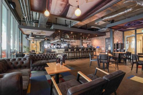 Hampshire Hotel - Fitland Oss