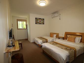 Hotel Zhangjiajie Red Apple Inn