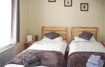 Four-bedroom Holiday Home In Caurel