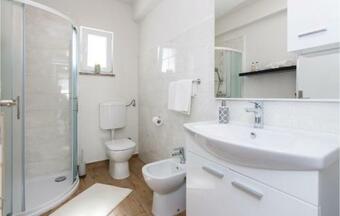 Six-bedroom Holiday Home In Galovac