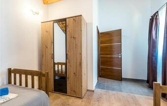 Awesome Home In Unesic W/ Outdoor Swimming Pool, Wifi And 3 Bedrooms