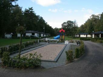 Modern Chalet With Outdoor Fireplace At The Forest