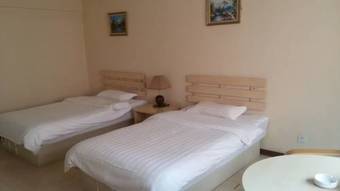 Apartamentos Manzhouli Super Nine Hotel